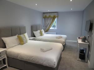 Krevet ili kreveti u jedinici u okviru objekta Craigievar Guest House