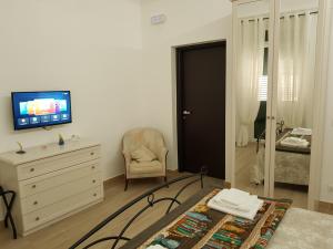 TV a/nebo společenská místnost v ubytování B&B da Mammina