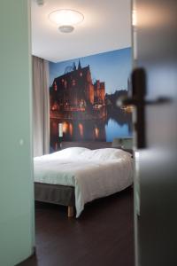 Voodi või voodid majutusasutuse Hotel Marcel toas