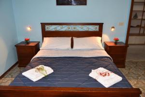 Postel nebo postele na pokoji v ubytování Vacanze dai Re