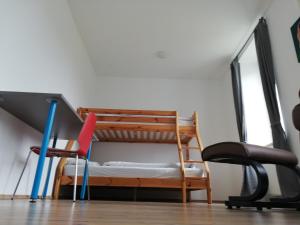 Poschodová posteľ alebo postele v izbe v ubytovaní Apartment Heiligenkreuz