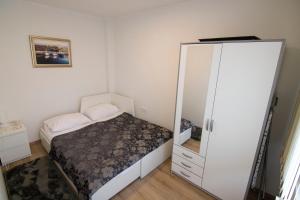 A bed or beds in a room at Volcano Rijeka