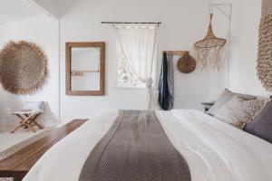 
A bed or beds in a room at A PERFECT STAY - Collective Retreat
