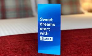 a blue sign that says sweet dreams start with samsung at Bettyhill Hotel in Bettyhill