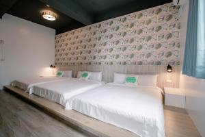 Postel nebo postele na pokoji v ubytování Starrywhale hostel
