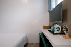 TV a/nebo společenská místnost v ubytování Starrywhale hostel