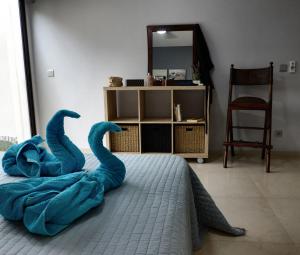 Letto o letti in una camera di Appartements Cayenne Standing