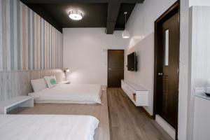 Postel nebo postele na pokoji v ubytování Starrywhale hostel