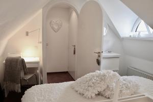 Voodi või voodid majutusasutuse Cavalli's Cottage toas