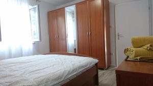 Postel nebo postele na pokoji v ubytování Ela Cres