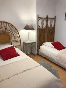 מיטה או מיטות בחדר ב-Côte de la Cité