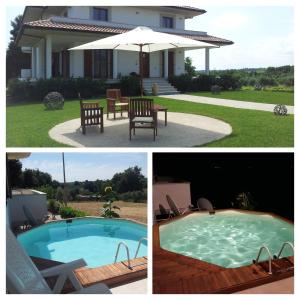 ein Haus mit einem Pool, einem Tisch und einem Sonnenschirm in der Unterkunft Il Leone Rosso over the hills of the Trabocchi in San Vito Chietino