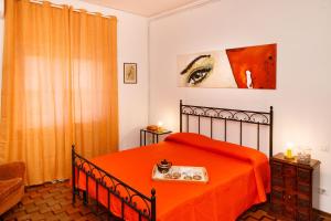 A bed or beds in a room at Casanna