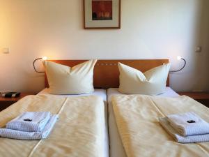 Ένα ή περισσότερα κρεβάτια σε δωμάτιο στο Gartenhaus Villa Sanssouci