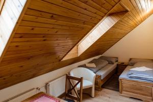 Postel nebo postele na pokoji v ubytování Apartmány Hrady
