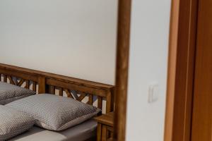 Postel nebo postele na pokoji v ubytování Apartmány Hrady