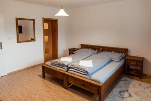 Postel nebo postele na pokoji v ubytování Apartmány Hrady