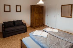 Postel nebo postele na pokoji v ubytování Apartmány Hrady