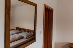 Postel nebo postele na pokoji v ubytování Apartmány Hrady