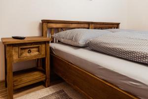 Postel nebo postele na pokoji v ubytování Apartmány Hrady