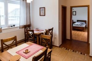 Postel nebo postele na pokoji v ubytování Apartmány Hrady