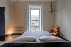 Letto o letti in una camera di Tutt 'e Sant Luxury Rooms