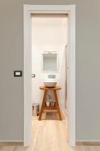 a bathroom with a sink and a mirror at Casa marina in Genoa
