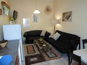 Maison Ambre Guesthouse tesisinde bir oturma alanı