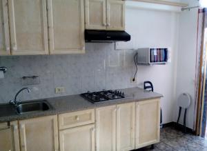 Dapur atau dapur kecil di A cozy flat in the heart of El Fraile