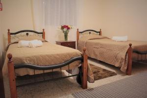 Ένα ή περισσότερα κρεβάτια σε δωμάτιο στο Salt Lake Town House