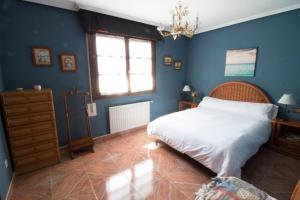 Postel nebo postele na pokoji v ubytování Casa Rural El FerJo