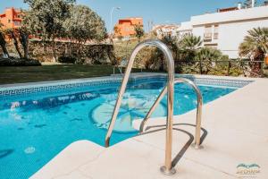 Bazén v ubytovaní Sol Ohana Apartamento Boutique alebo v jeho blízkosti