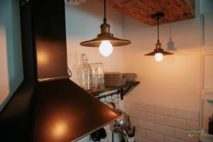 Kuchyňa alebo kuchynka v ubytovaní Sol Ohana Apartamento Boutique