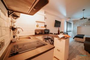 Kuchyňa alebo kuchynka v ubytovaní Sol Ohana Apartamento Boutique