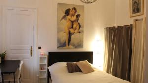 Postel nebo postele na pokoji v ubytování Chambres Privatives Chez l'Habitant