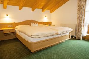 Postel nebo postele na pokoji v ubytování Haus am Schmiedweg