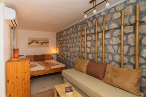 Ένα ή περισσότερα κρεβάτια σε δωμάτιο στο Apartments Mirian +72 φωτογραφίες