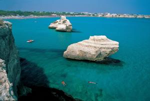 two large rocks in a large body of water at Residence Salento in Palmariggi