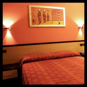 Cama o camas de una habitación en Hotel Cristina