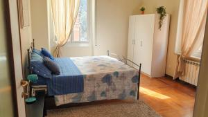 A bed or beds in a room at Assarotti Centre Apartment