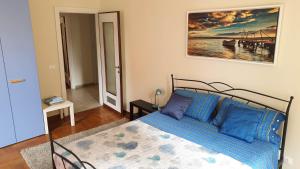 A bed or beds in a room at Assarotti Centre Apartment