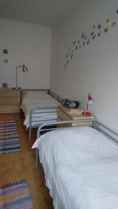 Cama o camas de una habitación en Apartman pod Dedovkou