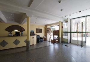Uma área de estar em Hotel Solneve