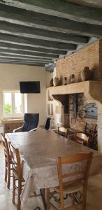 Posezení v ubytování Gîte L' authentique + 2 fotografie