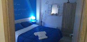 Postel nebo postele na pokoji v ubytování Casa Vacanze Trinacria