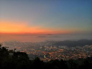 a view of a city at night at Hickory Penang Hill in George Town