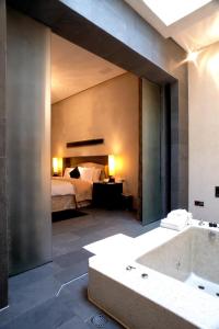 Ένα ή περισσότερα κρεβάτια σε δωμάτιο στο I DO Motel