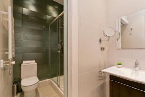 Kúpeľňa v ubytovaní Aspasios Rambla Catalunya Apartments
