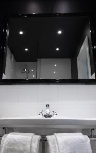 Koupelna v ubytování Supeluse-Strassel Beach Apartment