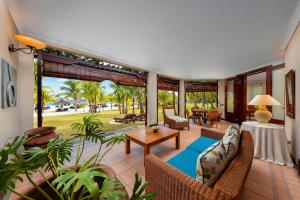 Гостиная зона в Dinarobin Beachcomber Golf Resort & Spa